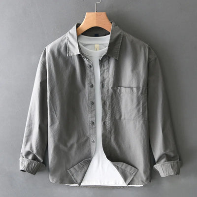 Spring new men's shirt with a high sense of fashion casual cotton loose shirt solid color match