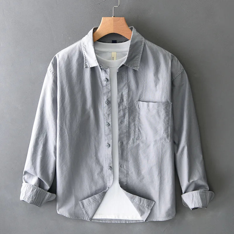 Spring new men's shirt with a high sense of fashion casual cotton loose shirt solid color match