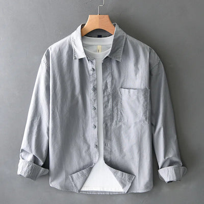 Spring new men's shirt with a high sense of fashion casual cotton loose shirt solid color match